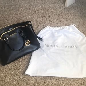 Michael Kors black and gold purse